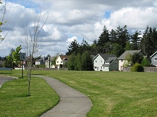 Views of the open space on the Parade Grounds on Bainbridge Island. Many homes line and back to the Parade Grounds. Views of the open space on the Parade Grounds on Bainbridge Island. Many homes line and back to the Parade Grounds.