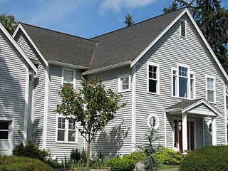A charming colonial style home sitting atop Fort Ward Hill Road on Bainbridge Island. A charming colonial style home sitting atop Fort Ward Hill Road. Homes on this side of the street have a stunning, unobstructed view of Rich Passage.
