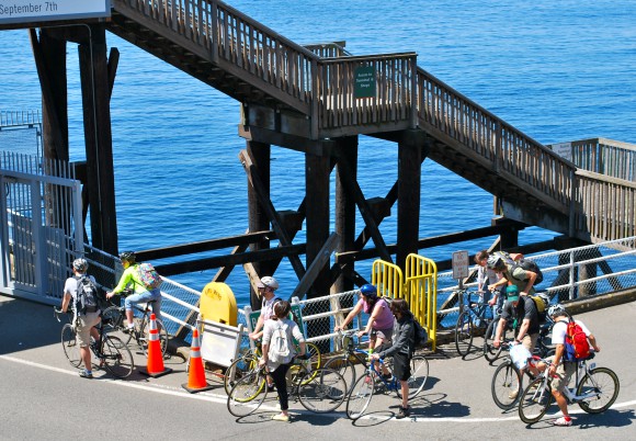 Cyclists getting on the Bainbridge Ferry, Seattle side in summer. Cyclists getting on the Bainbridge Ferry, Seattle side in summer.