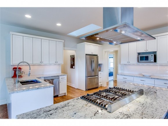 A bright white chef's kitchen. Perfect for entertaining.